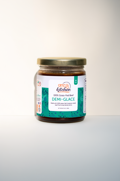 Jar of demi-glace sauce with a label on a white background