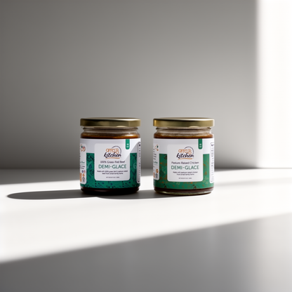 Two jars of 'Offcuts Kitchen' demi-glace on a white surface with a gray background